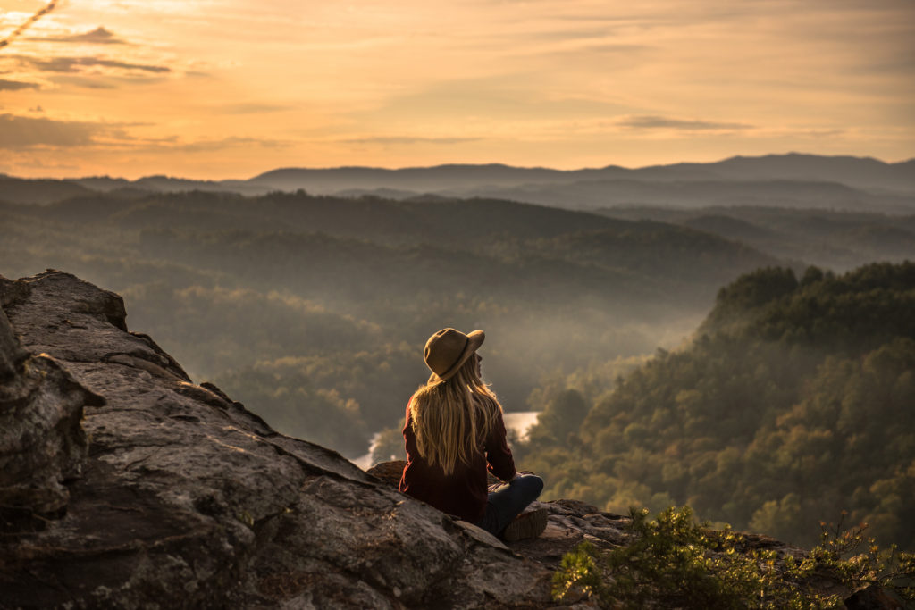 woman in solitude on mountain