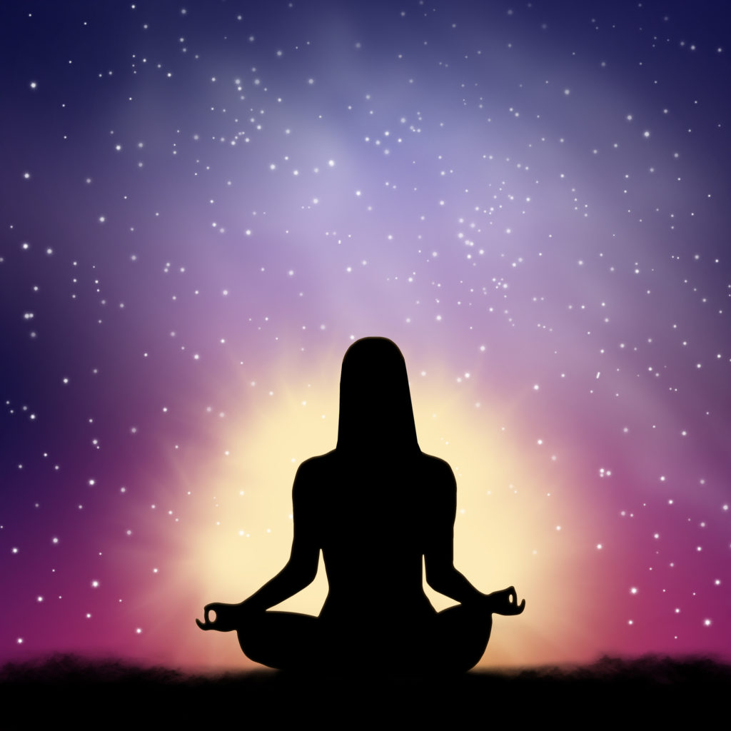 woman meditating under stars